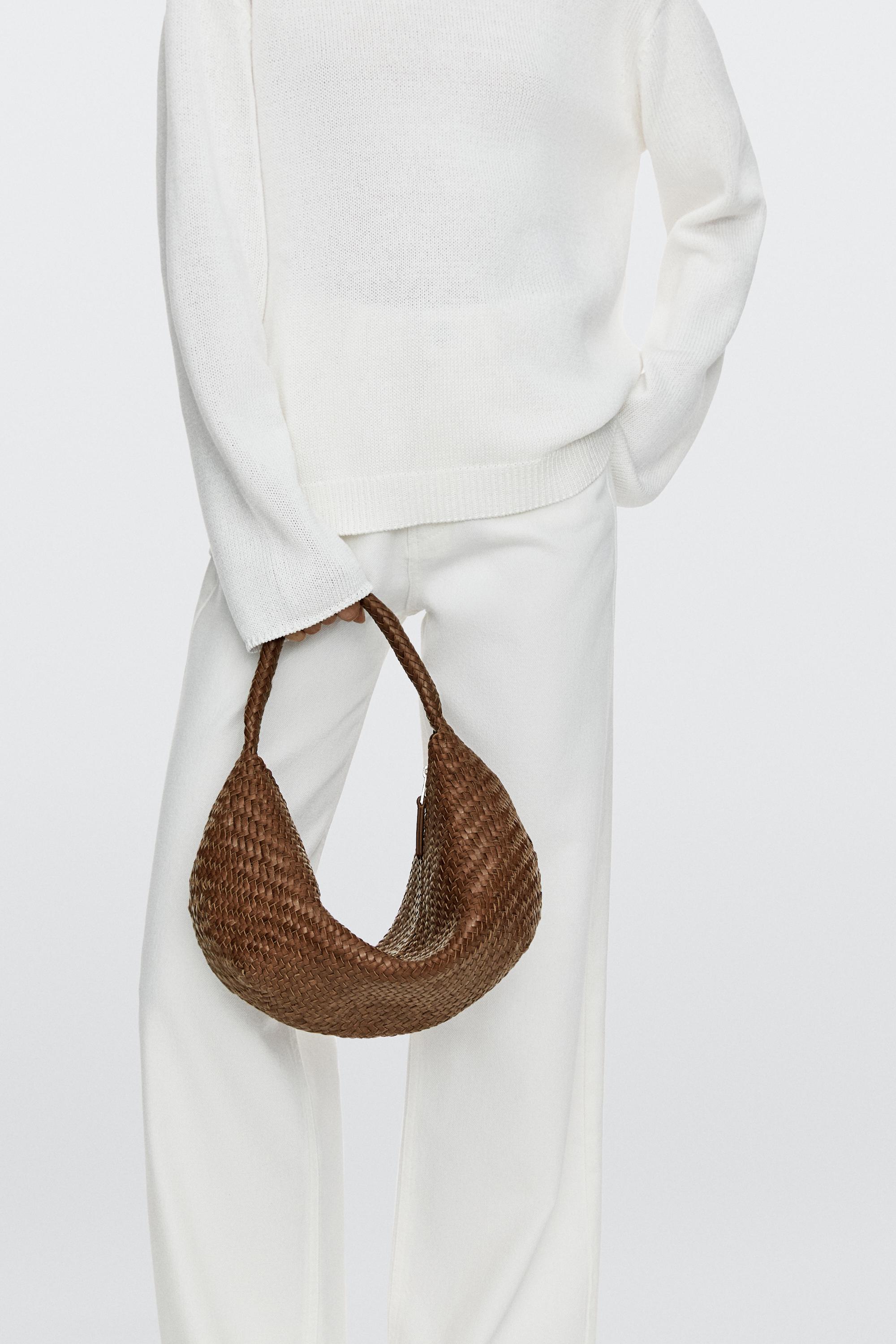 Sac demi-lune tressé cuir